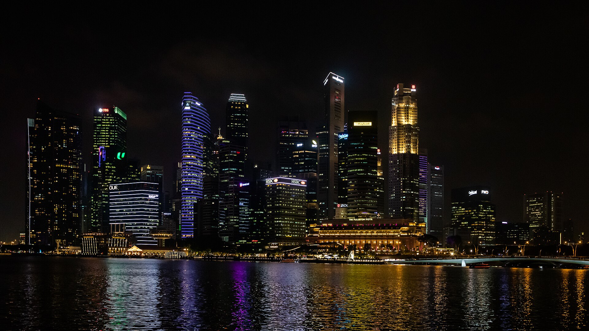 Singapore city lights reflected at night